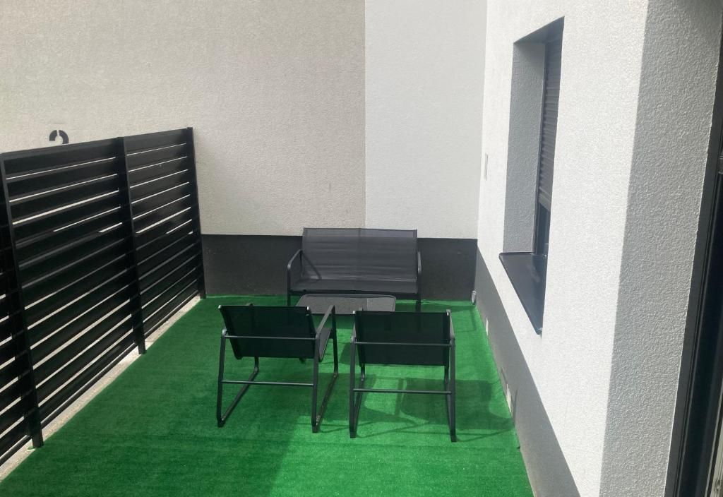 Apartman u centru sa privatnim dvorištem!